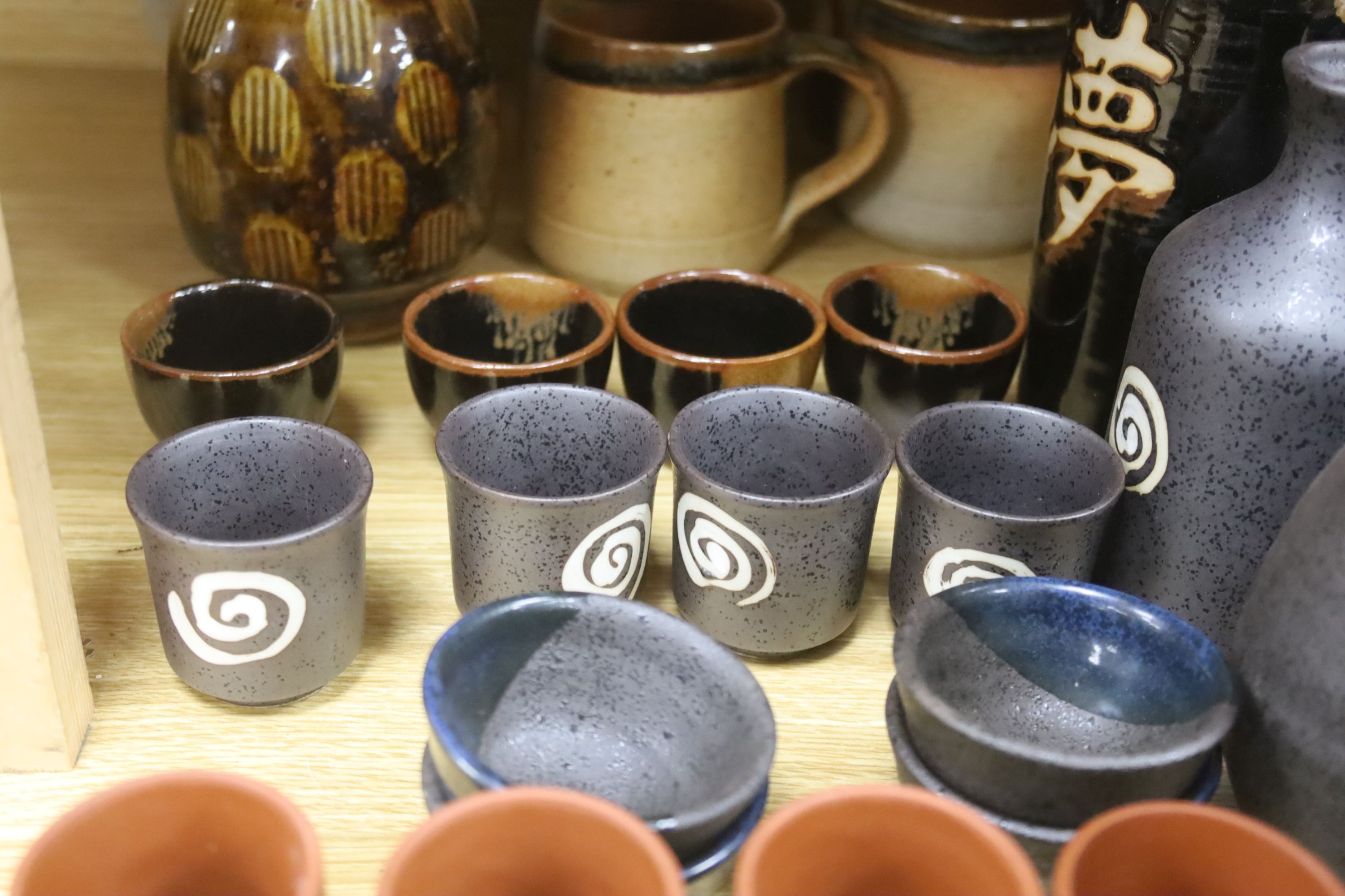 A collection of Studio pottery vases and a Bellarmine